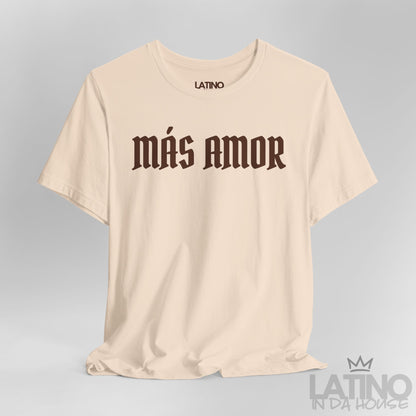 Close-up of soft cream Más Amor T-shirt with brown gothic lettering. Latino In Da House 