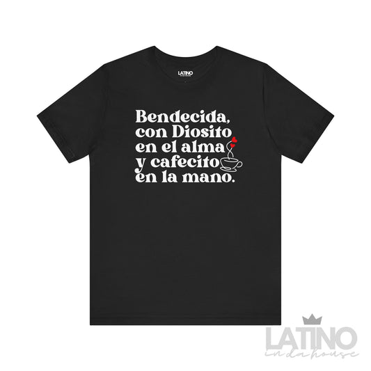 Black T-shirt with white Spanish text “Bendecida, con Diosito en el alma y cafecito en la mano” and a small red heart above a coffee cup illustration