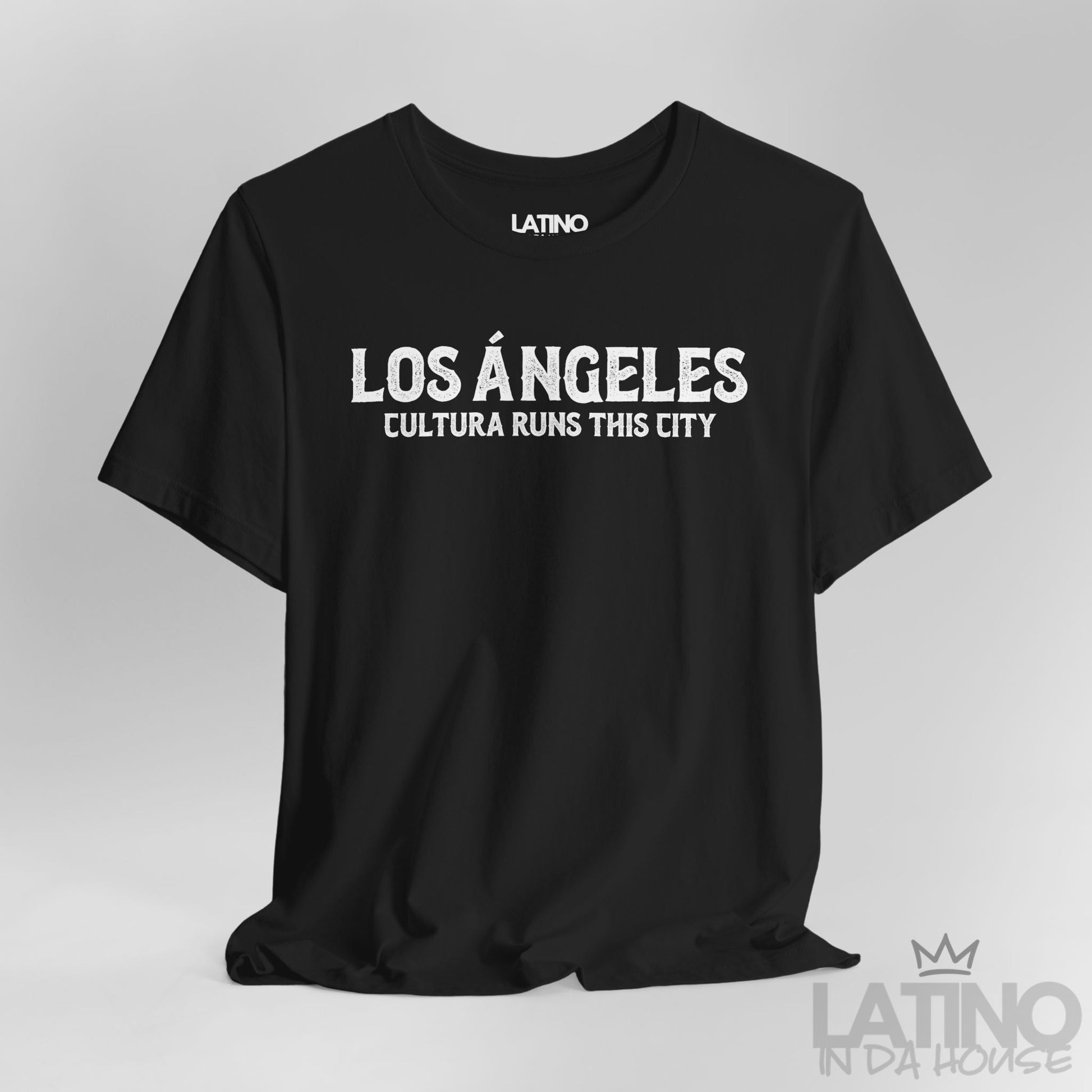 Close Up Los Ángeles Cultura Runs This City T-Shirt in black with bold distressed white lettering — Latino In Da House apparel