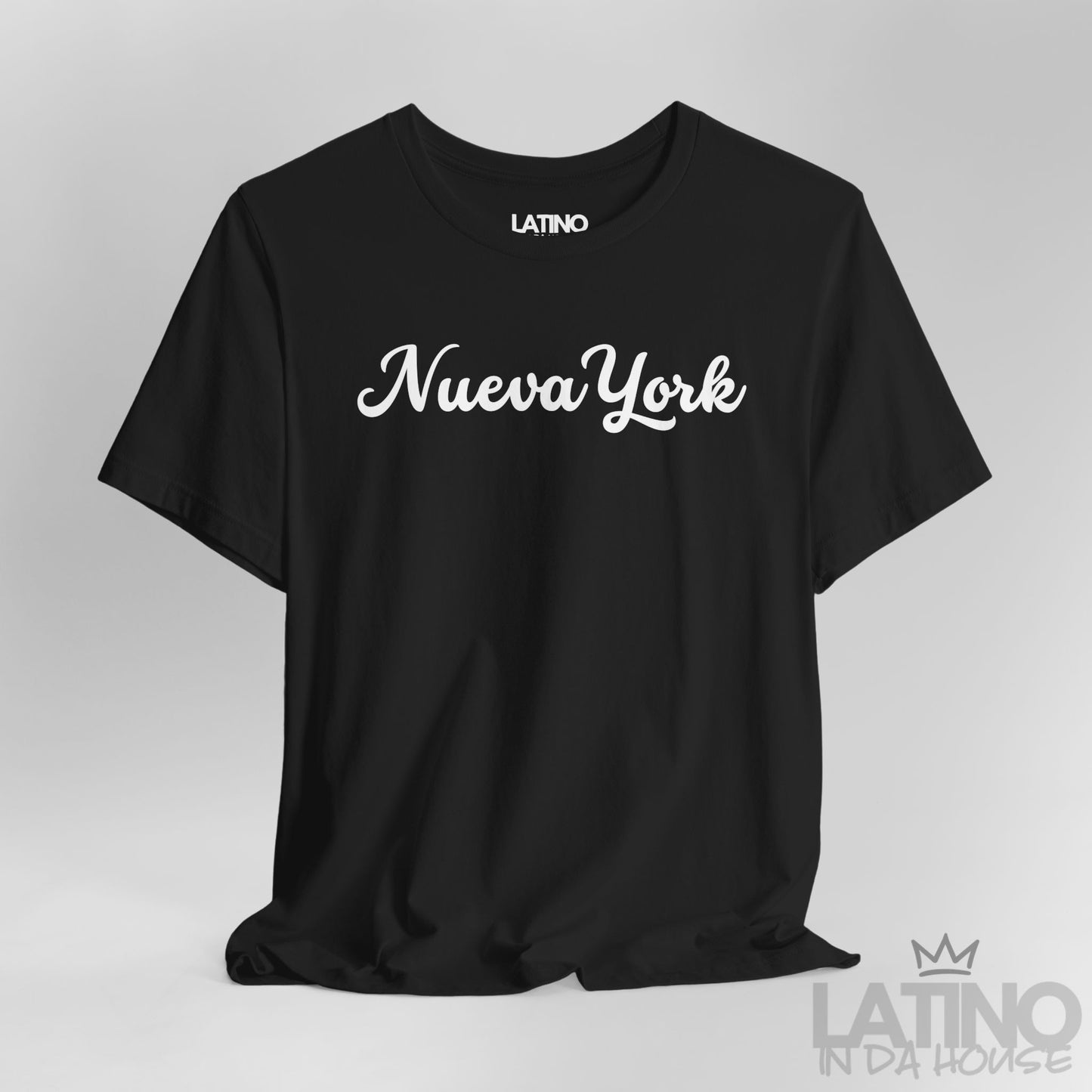 Close Up Nueva York black T-shirt with white script text, classic Latino lifestyle design. Latino In Da House 