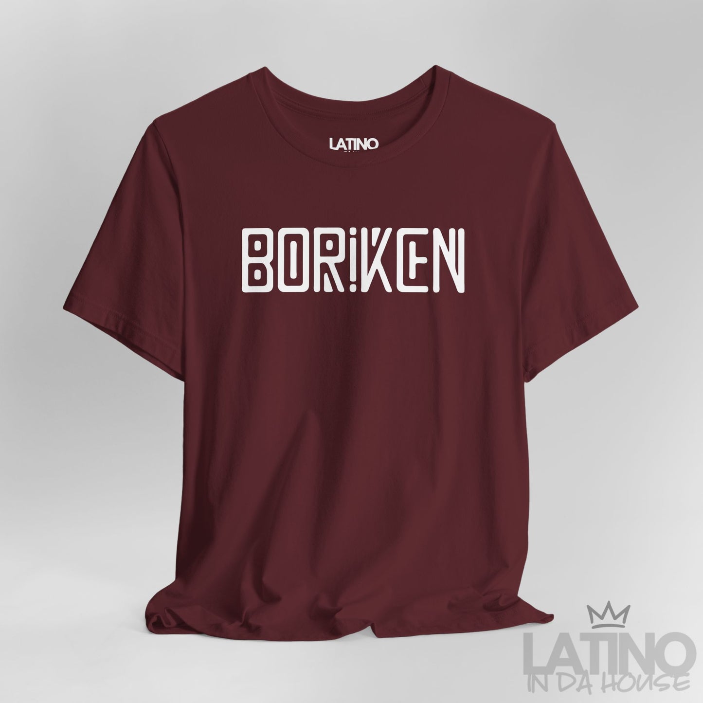 Close Up Maroon Borikén T-shirt with bold white block lettering inspired by Taíno motifs by Latino In Da House.