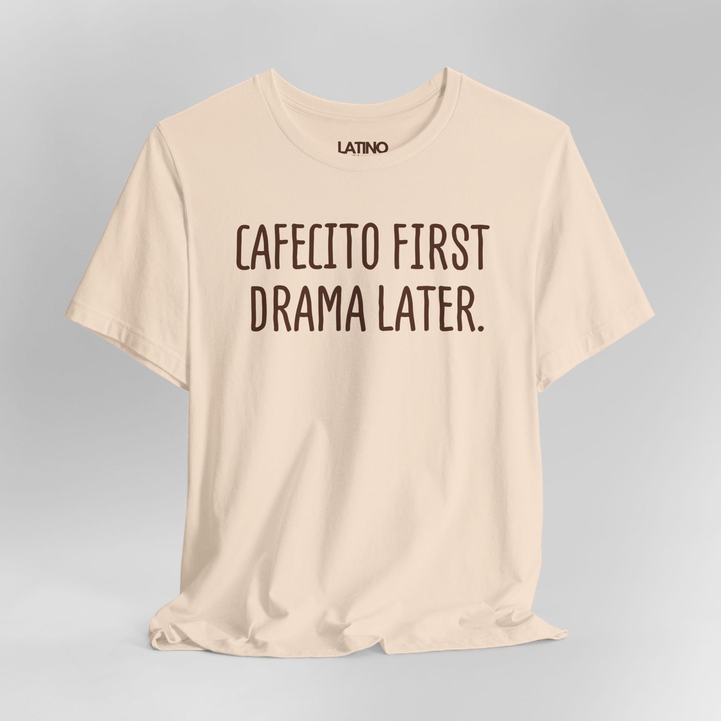 Close Up Soft Cream Cafecito First Drama Later T-shirt with white text funny coffee lover Latino graphic tee. Latino In Da House