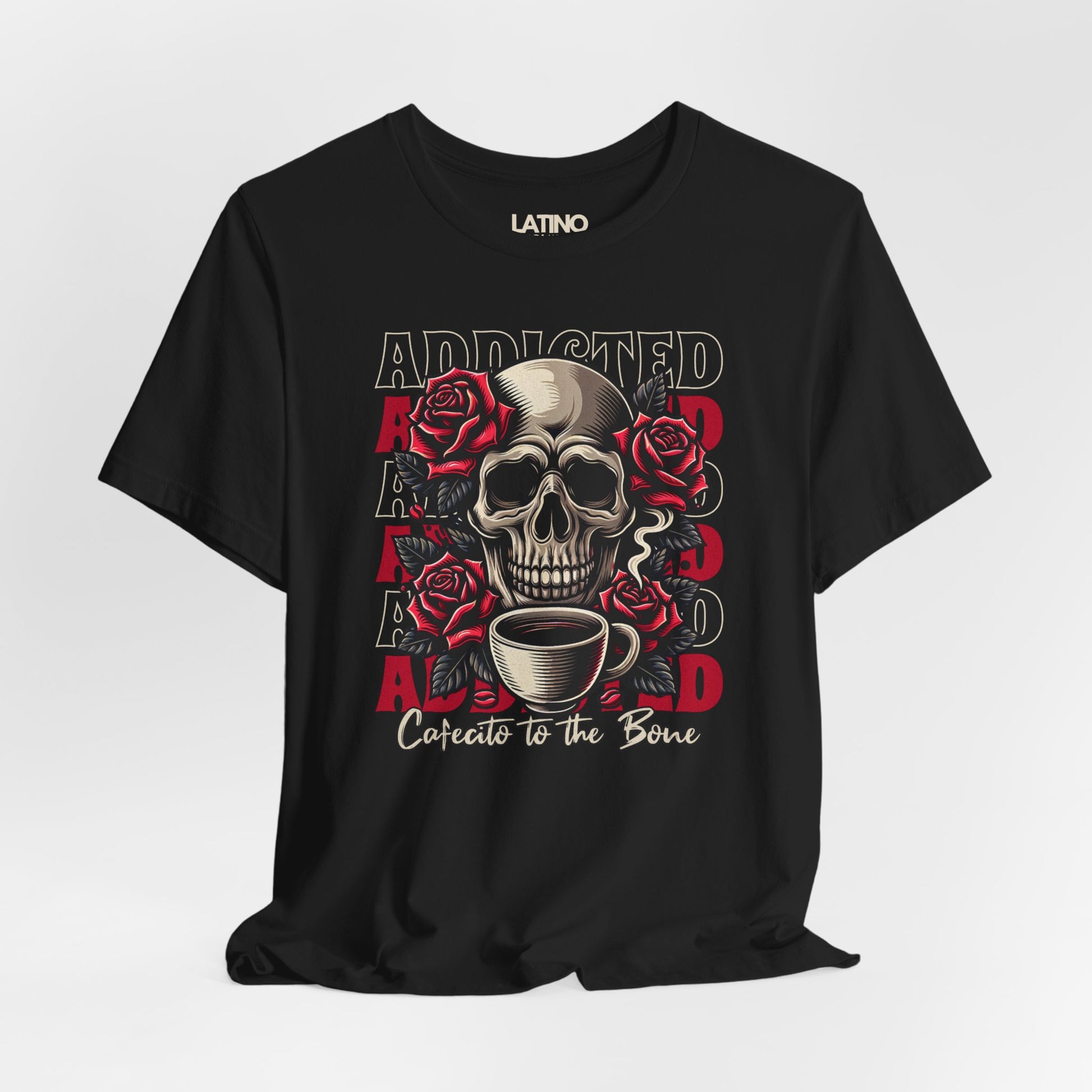 Close Up Black T-shirt with skull, roses, repeated "ADDICTED" backdrop, and script "Cafecito to the Bone. Latino In Da House