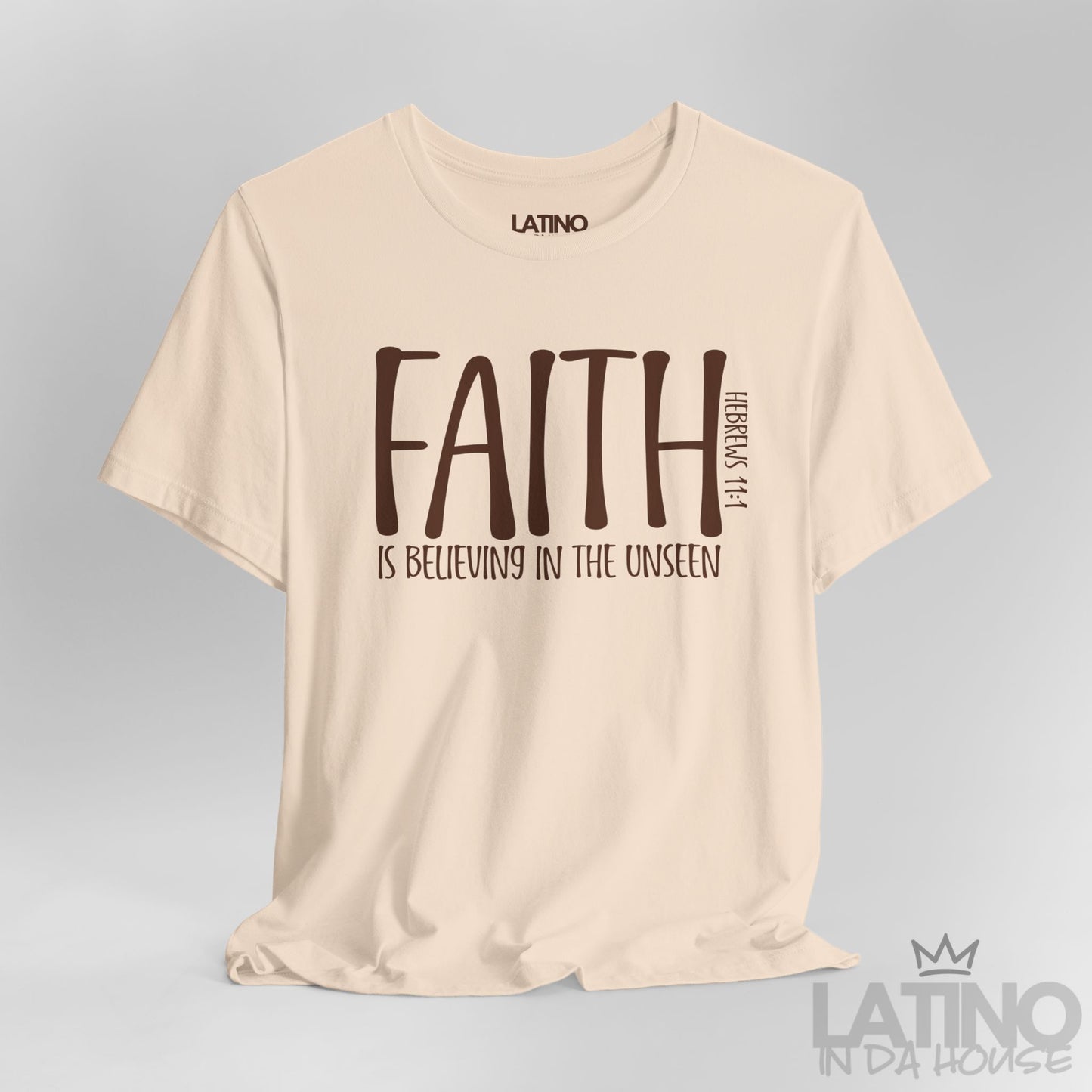 Close Up Faith Hebrews 11:1 T-Shirt in soft cream with brown lettering and scripture design. Latino In Da House 