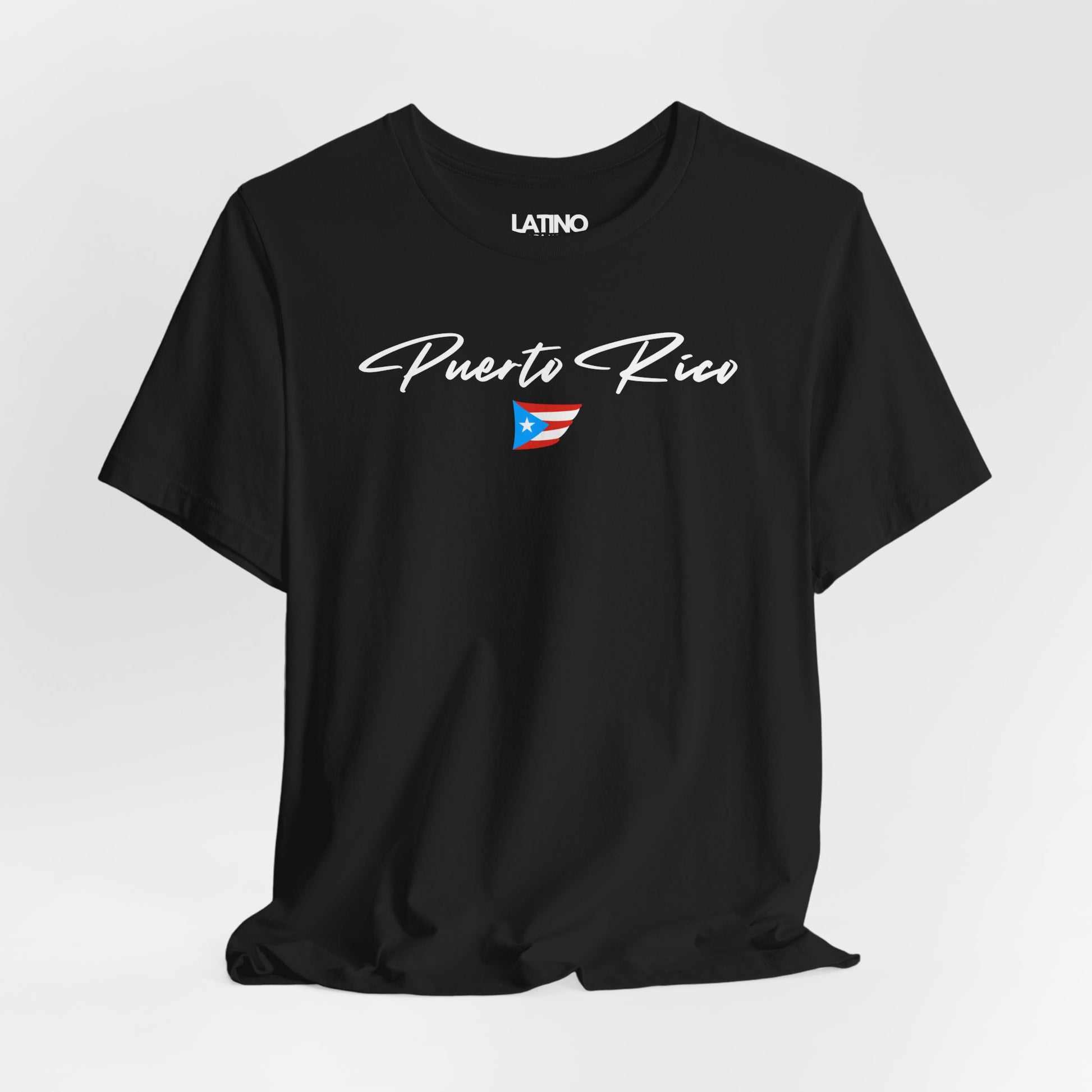 Close Up Black T-shirt with white Puerto Rico script lettering and small Puerto
Rican flag graphic by Latino In Da House.