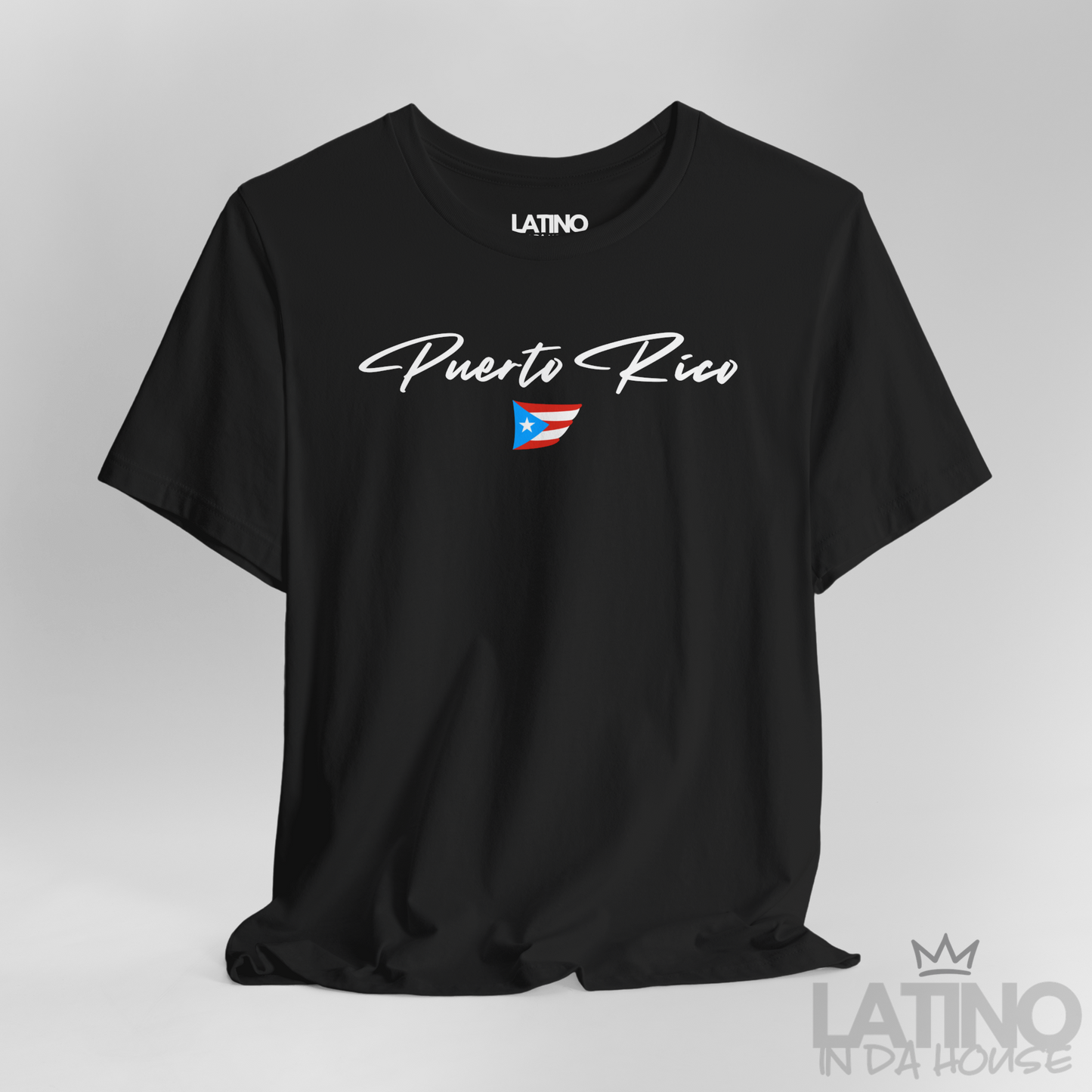 Close Up Black T-shirt with white Puerto Rico script lettering and small Puerto Rican flag graphic by Latino In Da House.
