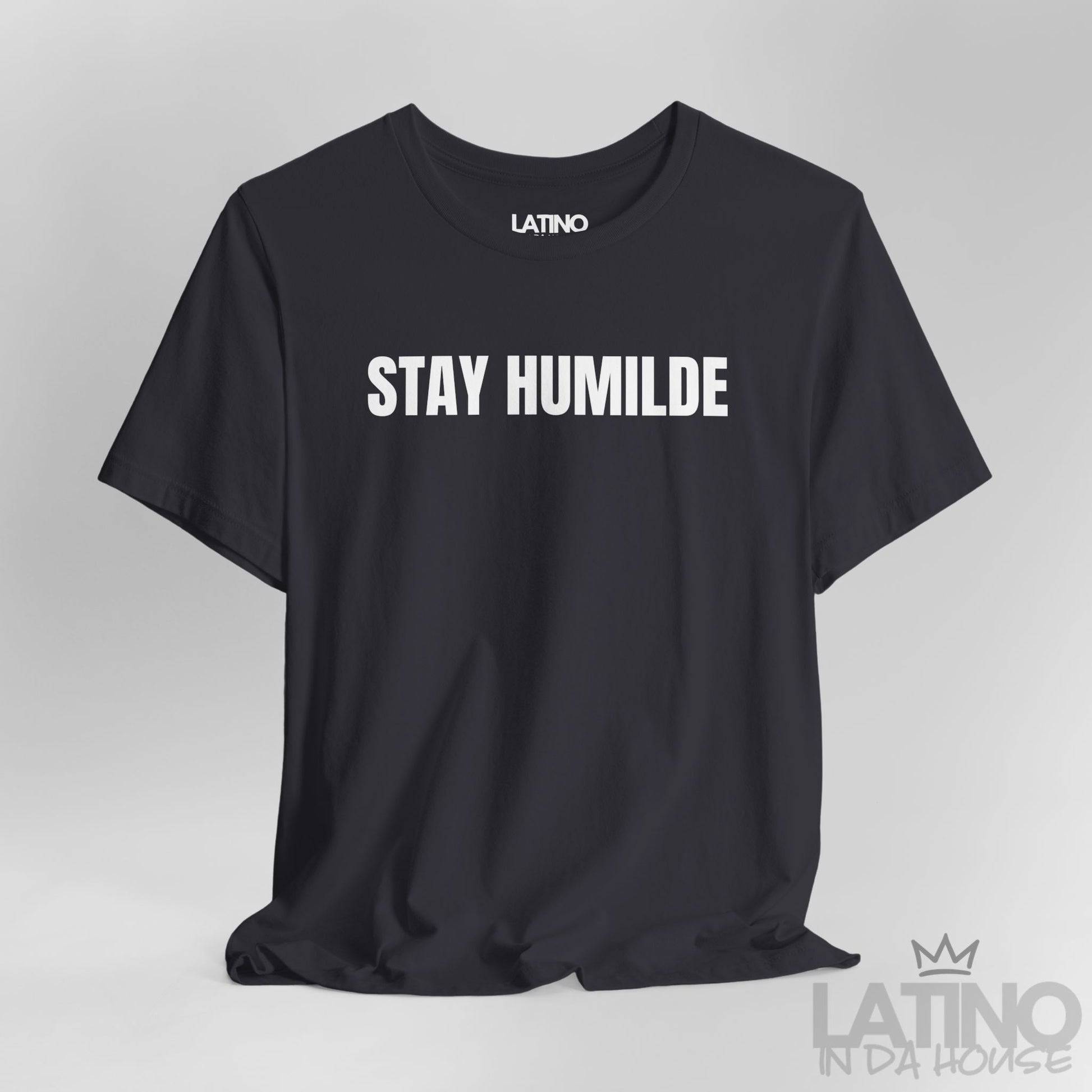 Close Up Dark grey Stay Humilde T-shirt with white and grey text, clean modern Latino lifestyle tee. Latino In Da House