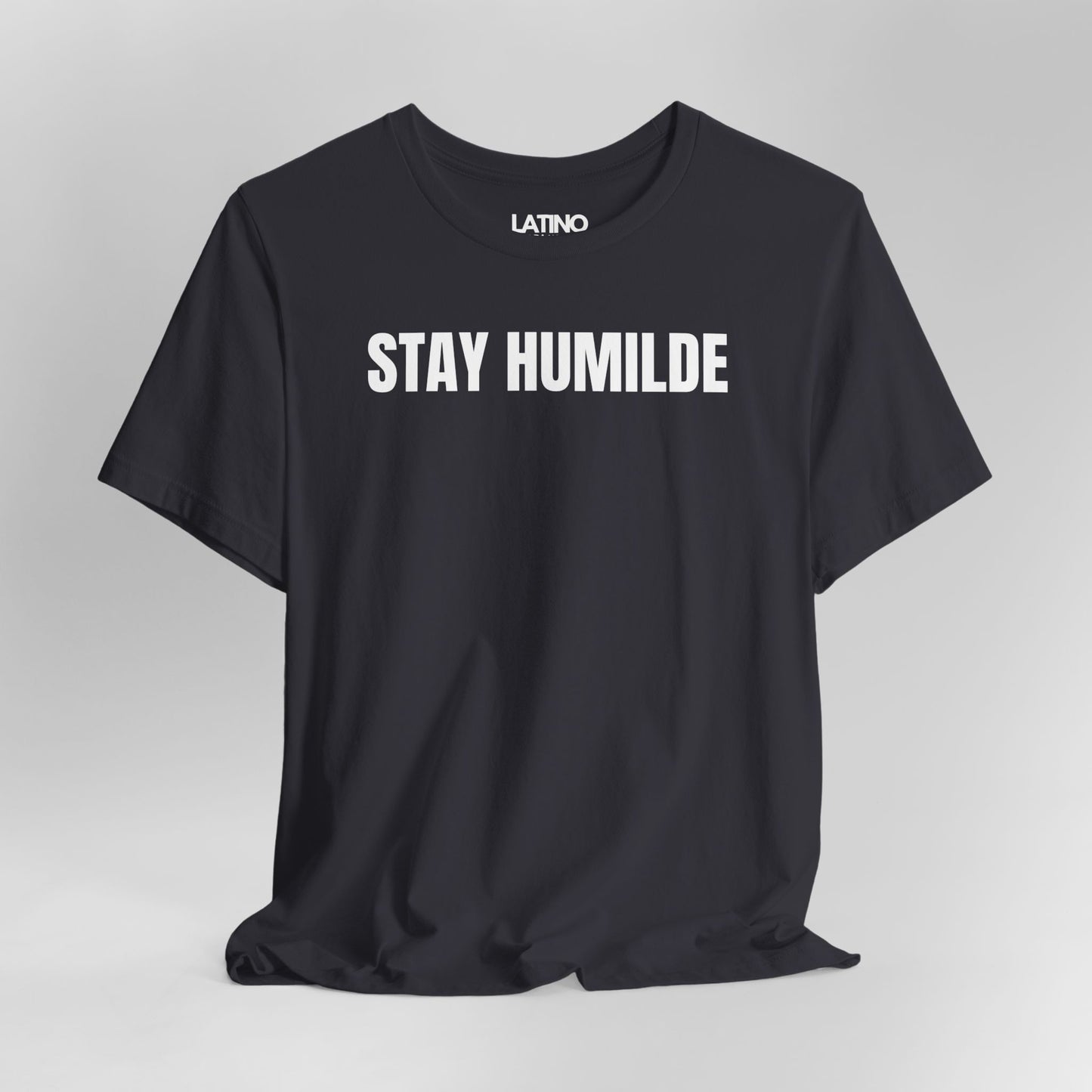 Close Up Dark Grey Stay Humilde 1-shirt with white text, minimalist Latino streetwear design promoting humility.
Latino In Da House