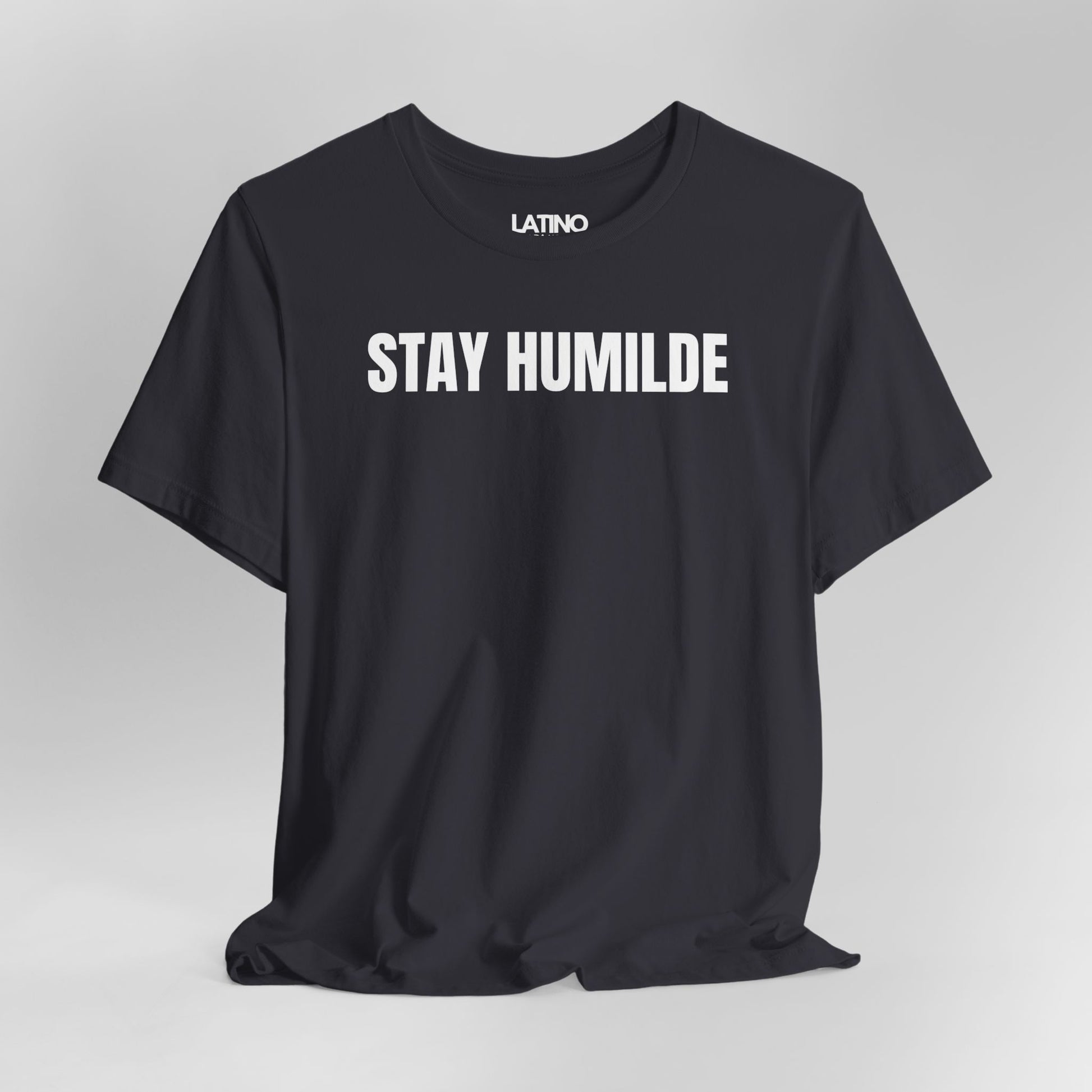 Close Up Dark Grey Stay Humilde 1-shirt with white text, minimalist Latino streetwear design promoting humility.
Latino In Da House