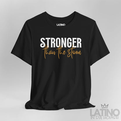 Close Up Stronger Than The Storm t-shirt in black – bold white and script caramel lettering. Latino In Da House 