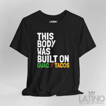 Close Up This Body Was Built on Guac y Tacos T-Shirt in black with bold white, green, red, and yellow text — funny Latino foodie tee. Latino In Da House 