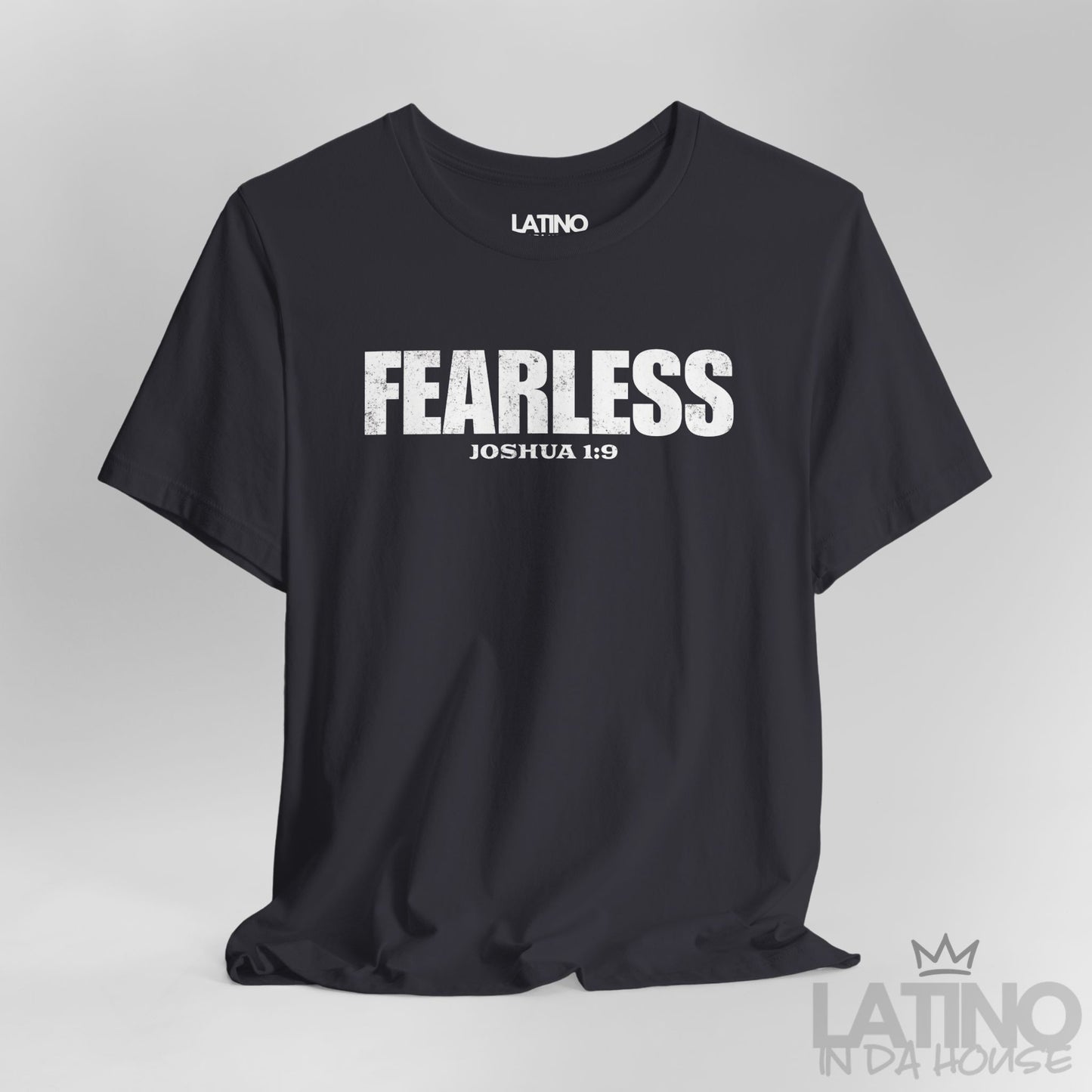 Close-up of Fearless Dark Grey T-Shirt showing distressed typography and Joshua 1:9 verse. Latino In Da House 