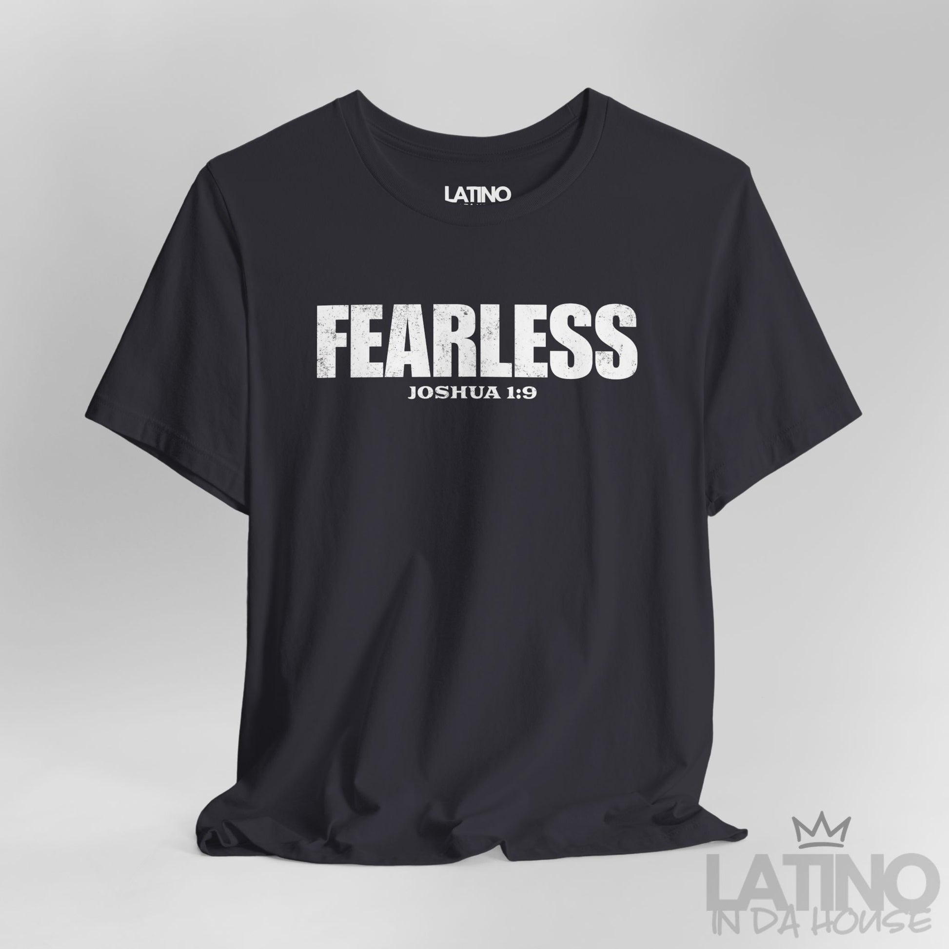 Close-up of Fearless Dark Grey T-Shirt showing distressed typography and Joshua 1:9 verse. Latino In Da House 