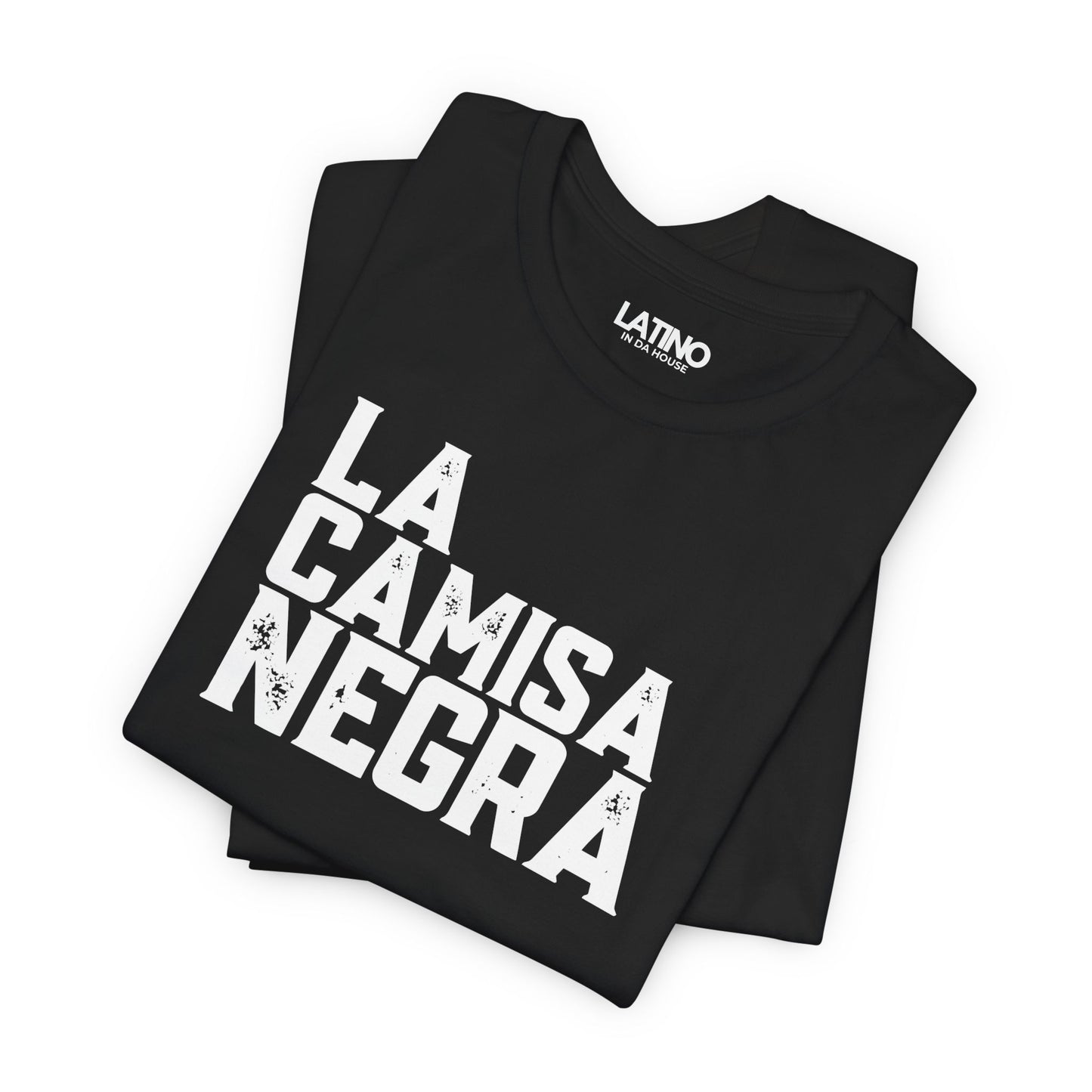 Folded La Camisa Negra Distressed T-Shirt in black with bold white lettering - Latino In Da House.