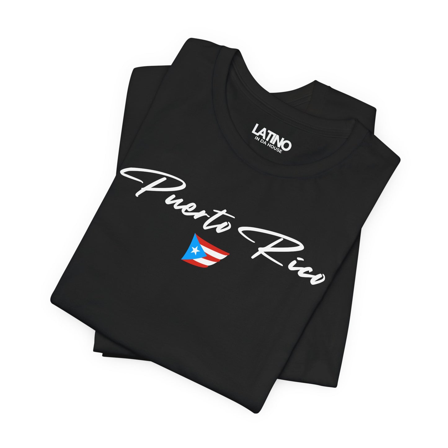 Folded Black T-shirt with white Puerto Rico script lettering and small Puerto
Rican flag graphic by Latino In Da House.