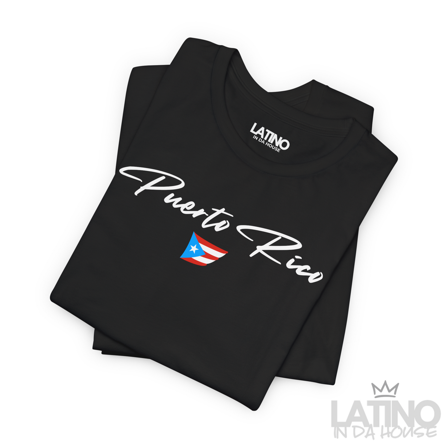 Folded Black T-shirt with white Puerto Rico script lettering and small Puerto Rican flag graphic by Latino In Da House.
