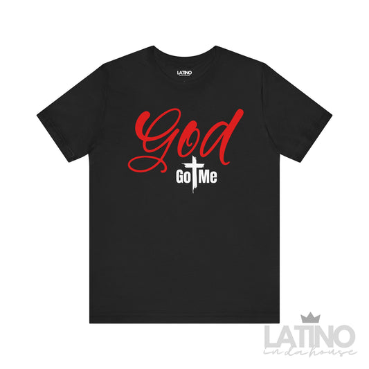 Black T-shirt with the phrase ‘God Got Me’ — ‘God’ in bold red script font, ‘Got Me’ in white block letters with a cross forming the ‘T’.