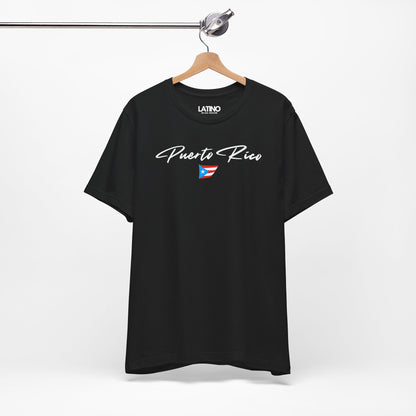 On Hanger Black T-shirt with white Puerto Rico script lettering and small Puerto
Rican flag graphic by Latino In Da House.