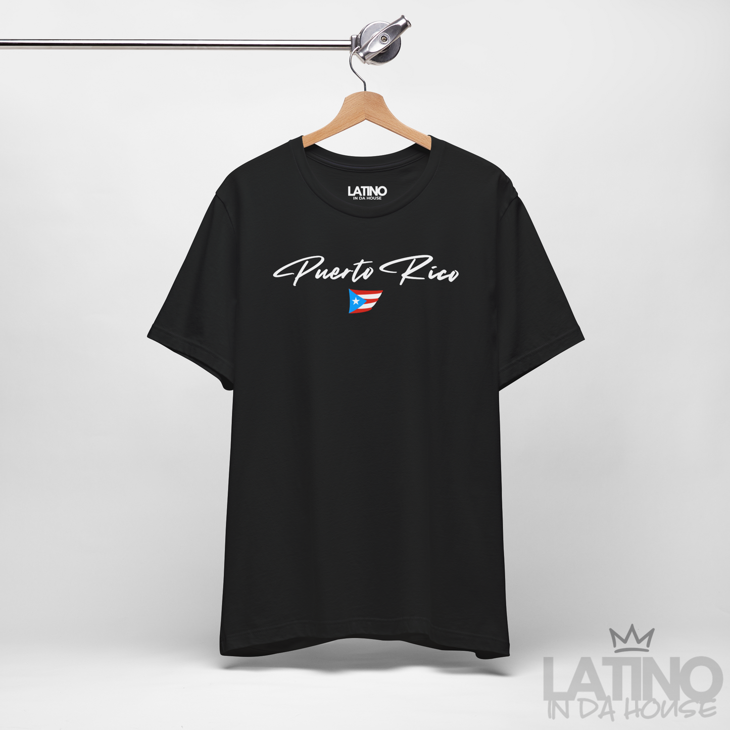 On Hanger Black T-shirt with white Puerto Rico script lettering and small Puerto Rican flag graphic by Latino In Da House.