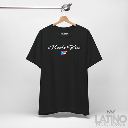 On Hanger Black T-shirt with white Puerto Rico script lettering and small Puerto Rican flag graphic by Latino In Da House.