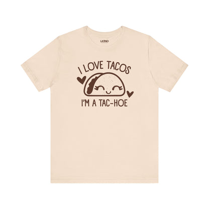 Love Tacos I'm a Tac-Hoe T-Shirt in cream with brown print - playful and sassy taco-lover design. Latino In Da House