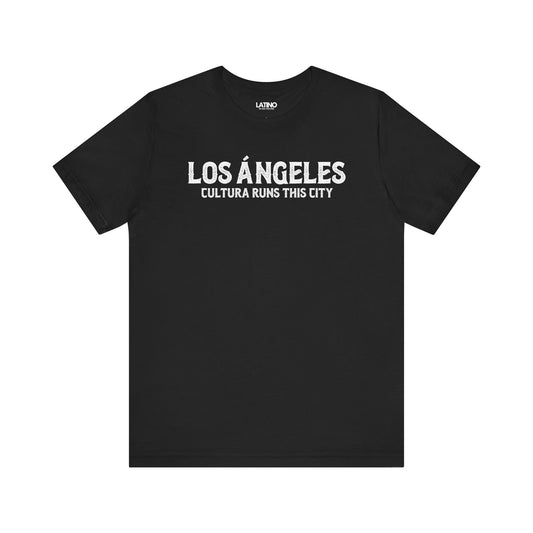 Los Ángeles Cultura Runs This City T-Shirt in black with bold distressed white lettering — Latino In Da House apparel