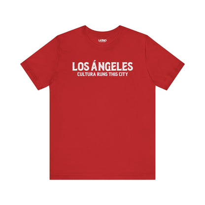 Los Ángeles Cultura Runs This City T-Shirt in vibrant red with white lettering
- Latino pride design. Latino In Da House