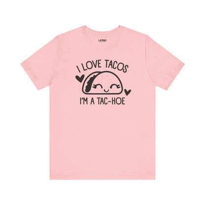Love Tacos I'm a Tac-Hoe T-Shirt in pink with black print - playful and sassy taco-lover design. Latino In Da House