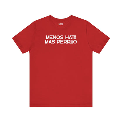 Red Menos Hate Más Perreo T-shirt with bold white text, reggaetón-inspired Latino streetwear. Latino In Da House