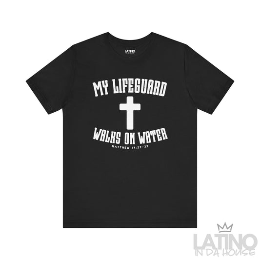 Black t-shirt with white cross and text ‘My Lifeguard Walks on Water – Matthew 14:22–32.’ Latino In Da House 