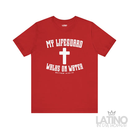 Red t-shirt with white cross and text ‘My Lifeguard Walks on Water – Matthew 14:22–32.’ Latino In Da House 
