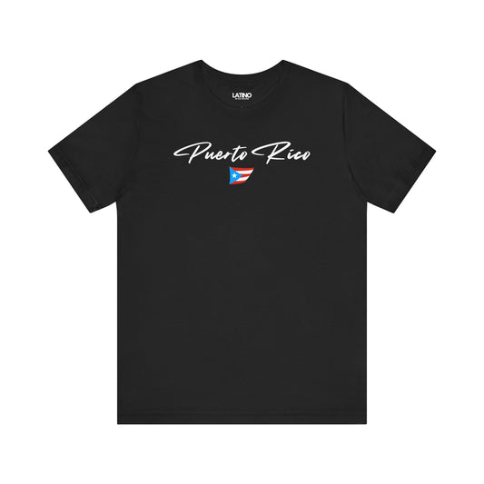 Black T-shirt with white Puerto Rico script lettering and small Puerto Rican flag graphic by Latino In Da House.