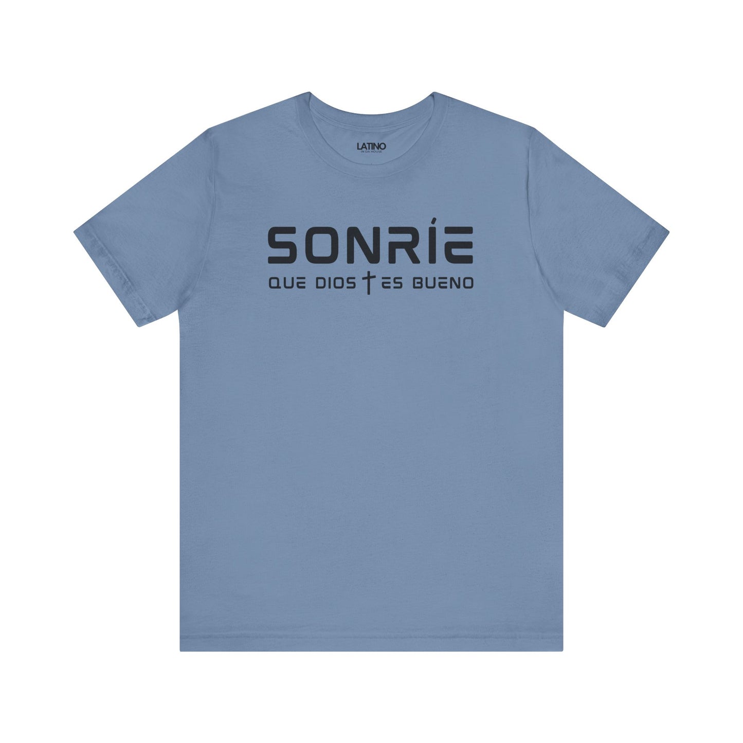 Sonríe Que Dios Es Bueno T-shirt in steel blue with modern black lettering and cross divider. Latino In Da House