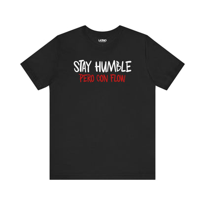 Black Stay Humble Pero Con Flow T-shirt with white text, minimalist Latino streetwear design promoting humble and flow. Latino In Da House