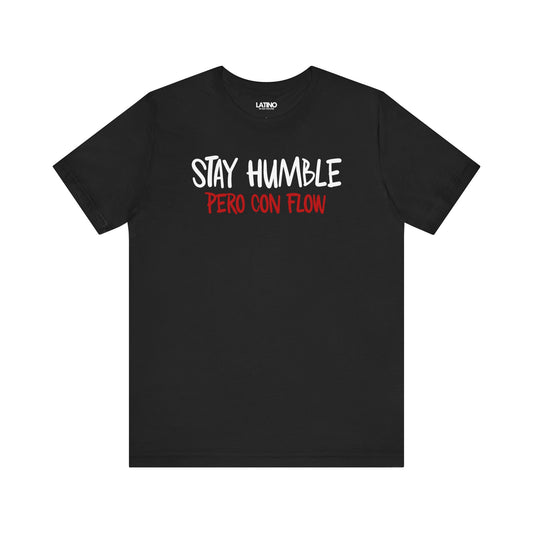 Black Stay Humble Pero Con Flow T-shirt with white text, minimalist Latino streetwear design promoting humble and flow. Latino In Da House