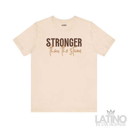 Stronger Than The Storm tee in soft cream – brown and caramel typography. Latino In Da House 