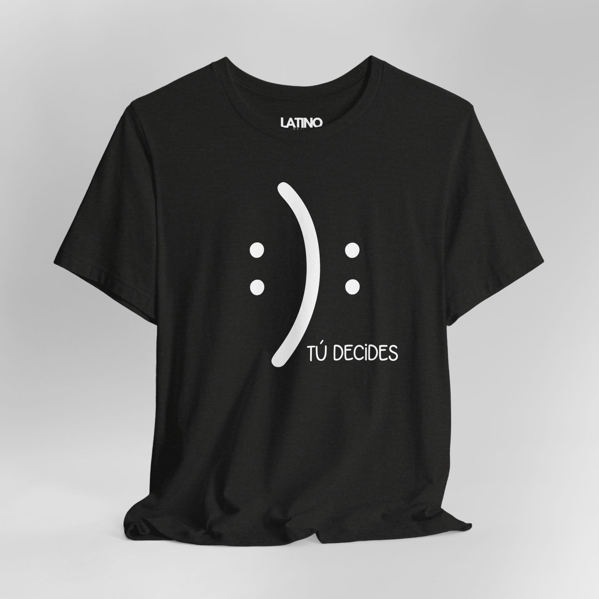 Close up  Decides T-Shirt in black featuring minimalist half-smile and half-frown design with text Tú Decides. Latino In Da House